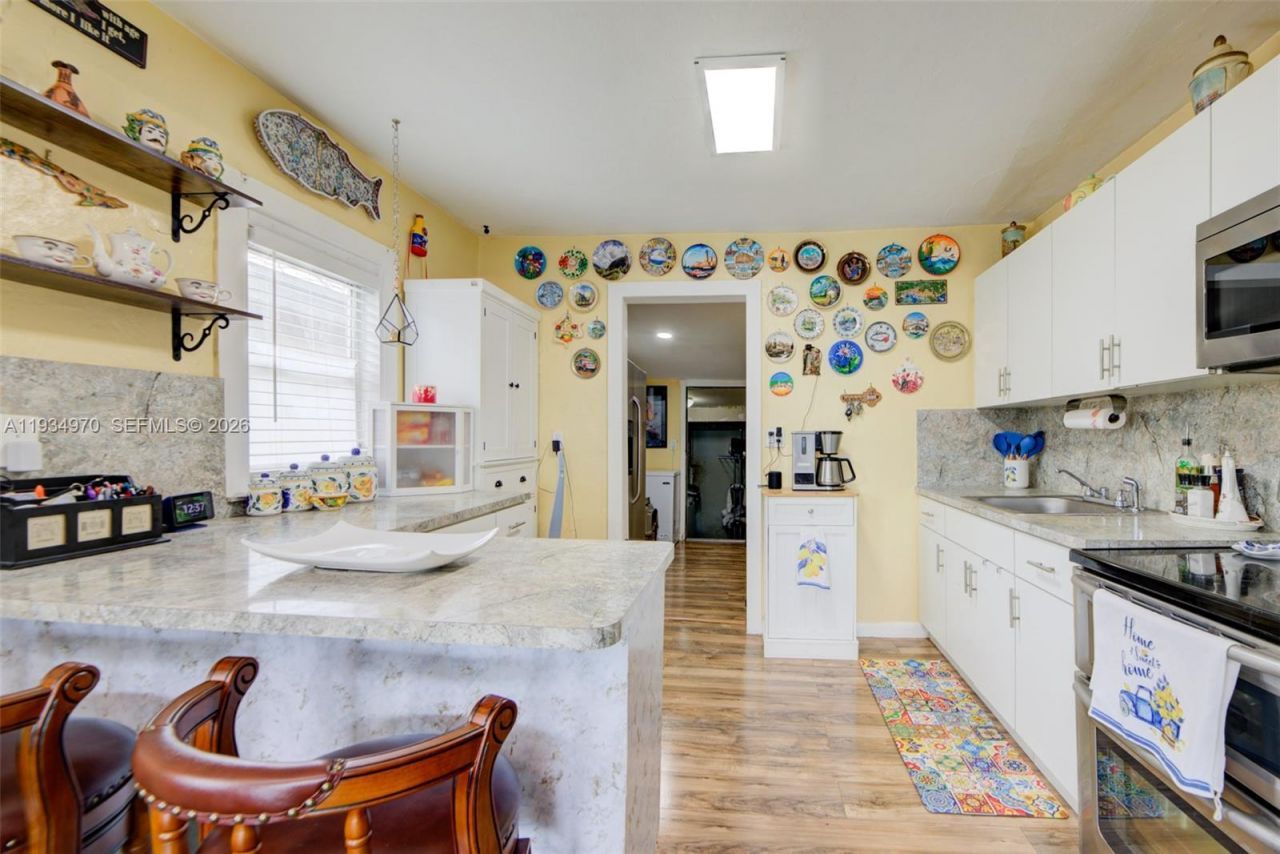 1911 NW 52nd St , Miami, FL 33142 Photo