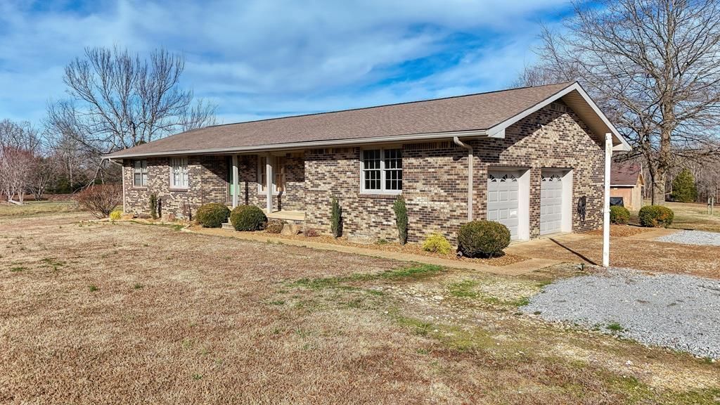 628 Tom White Rd, Big Sandy, TN 38221 Main Photo