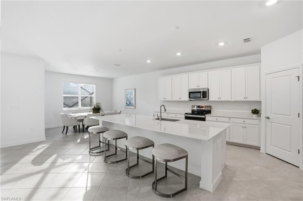 9311 Aqua Overlook Ct, Lehigh Acres, FL 33936 Photo