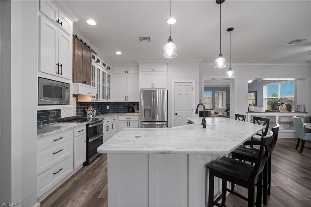 12741 SW Pembroke Cir S, Lake Suzy, FL 34269 Photo