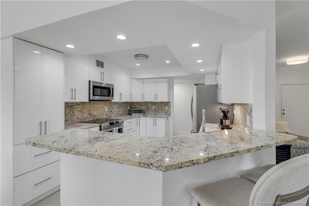 303 Sea Oats Drive, Unit A, Juno Beach, FL 33408 Photo