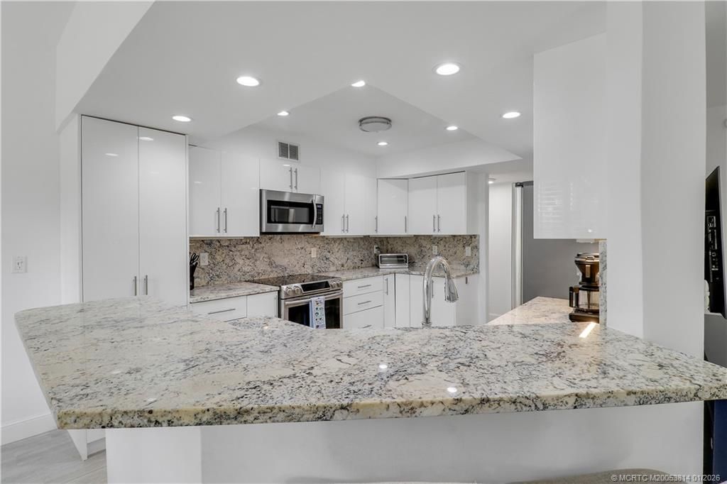 303 Sea Oats Drive, Unit A, Juno Beach, FL 33408 Photo