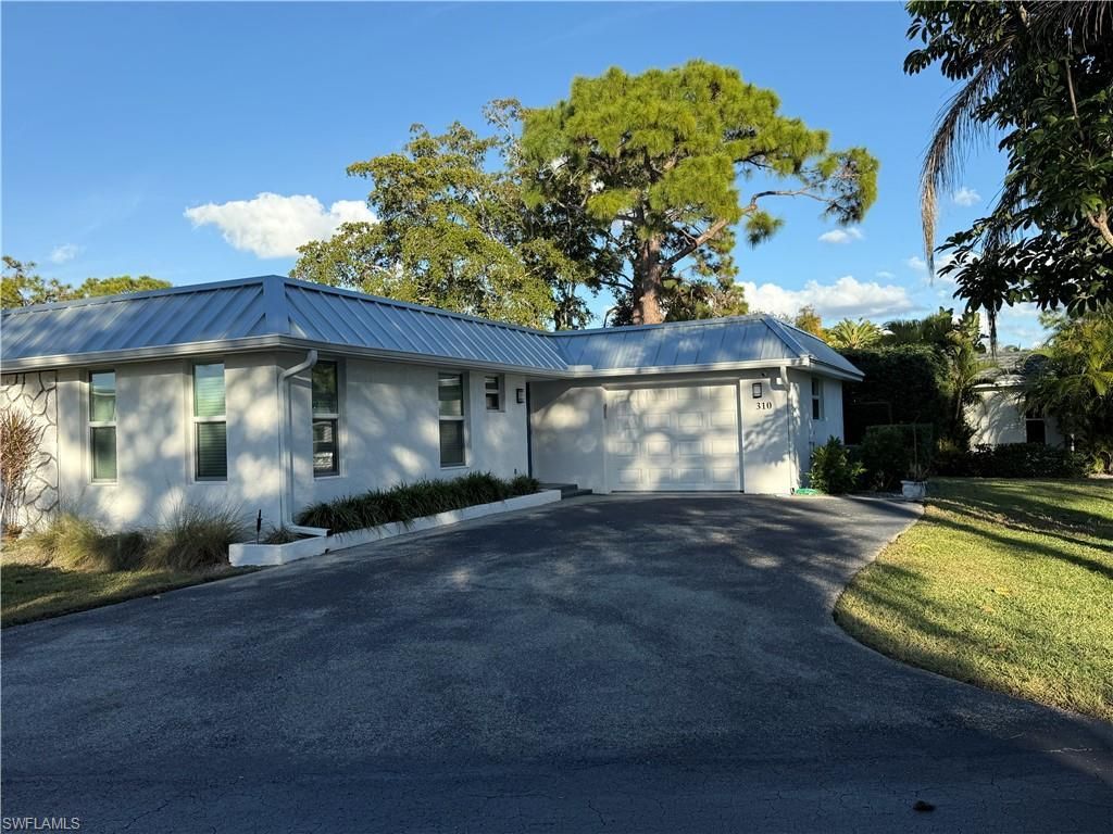 310 Carnaby Ct, Naples, FL 34112 Photo