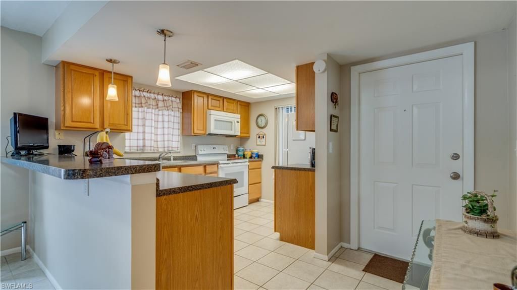 309 Nicholas Pkwy W, Unit 102, Cape Coral, FL 33991 Photo