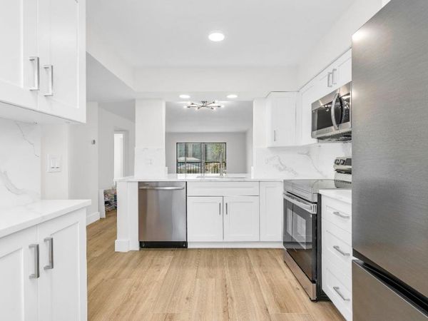 7290 Kinghurst Drive, Unit 301, Delray Beach, FL 33446