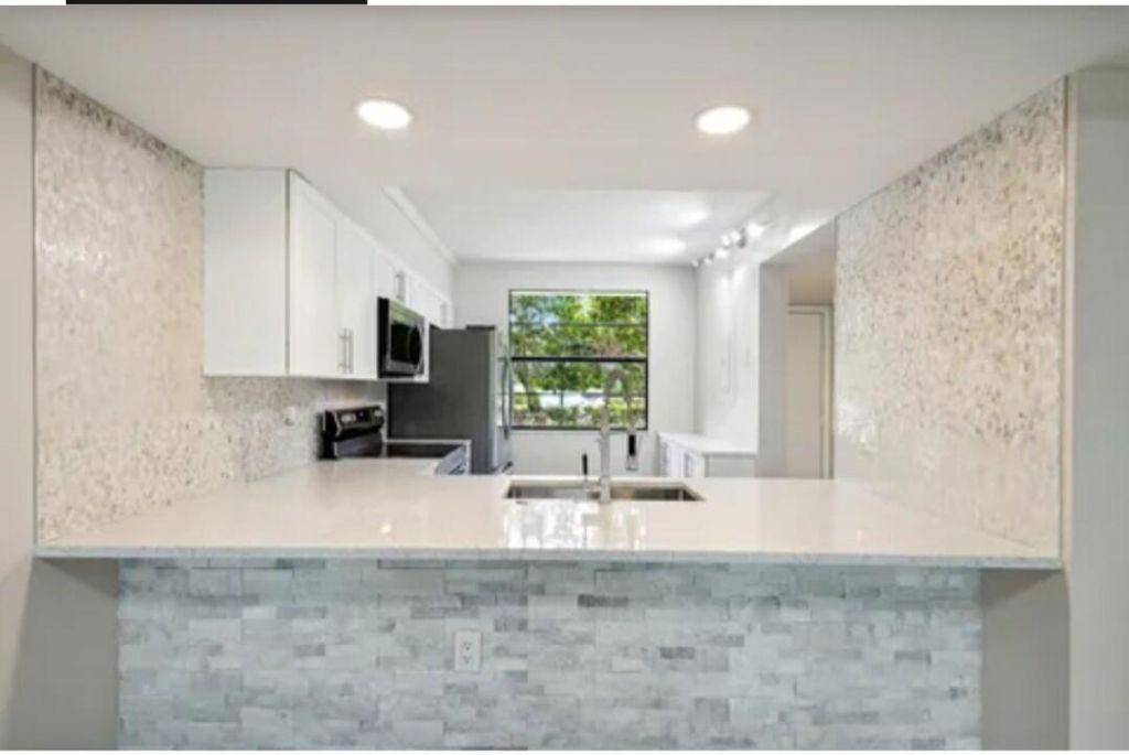 3507 Village Boulevard, Unit 105, West Palm Beach, FL 33409 Photo