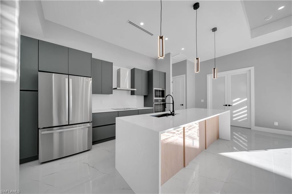 911 NW 37th Pl , Cape Coral, FL 33993 Photo