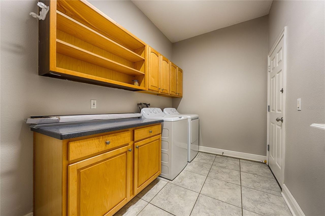 7019 Five Oaks Drive, Harmony, FL 34773 Photo