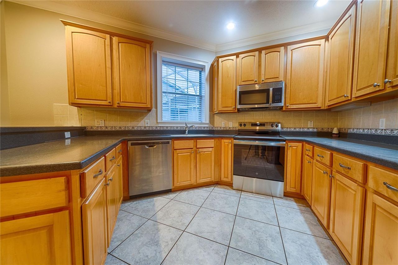 7019 Five Oaks Drive, Harmony, FL 34773 Photo