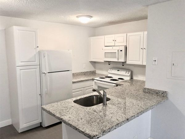 651 Lyons Road, Unit 10104, Coconut Creek, FL 33063