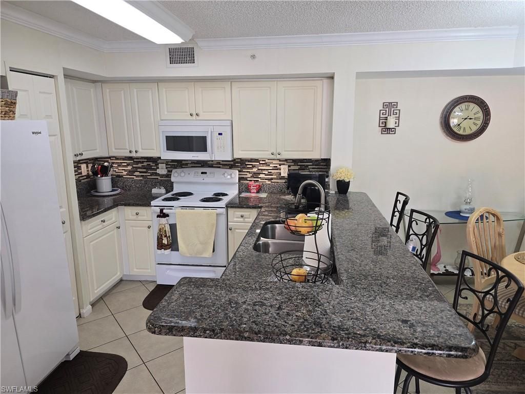 1210 Wildwood Lakes Blvd, Unit 203, Naples, FL 34104 Photo