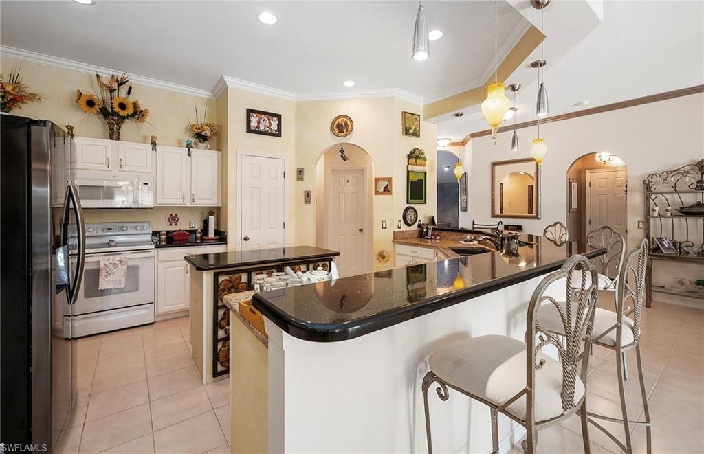 23418 Olde Meadowbrook Cir, Estero, FL 34134 Photo