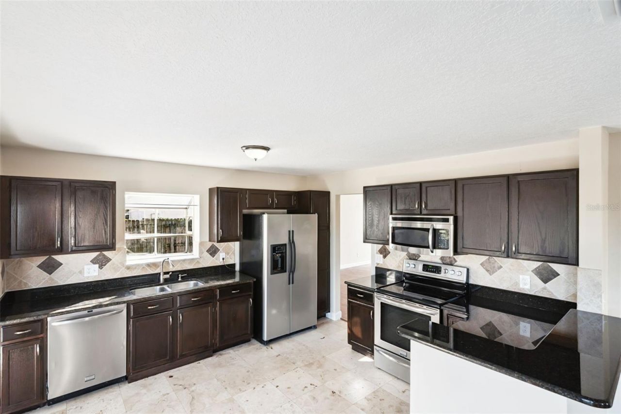 5439 Red Bone Lane, Orlando, FL 32810 Photo