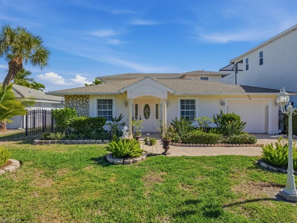 141 Pago Pago Dr E, Naples, FL 34113 Photo