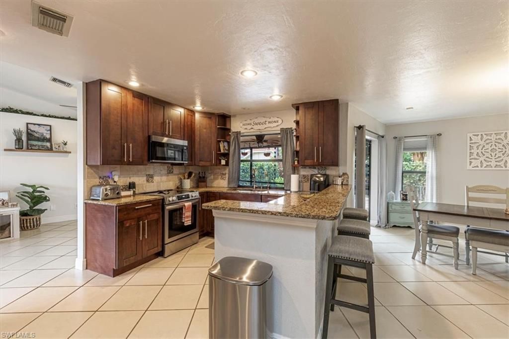 10590 Woodchuck Ln, Bonita Springs, FL 34135 Photo