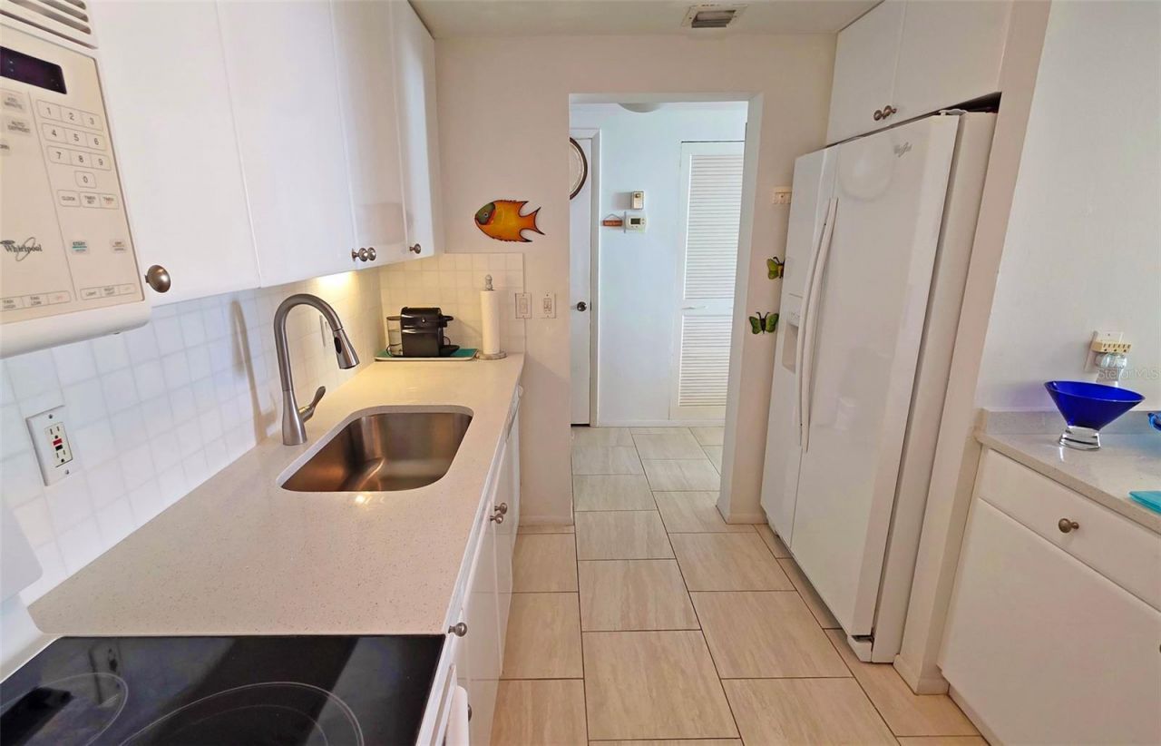 1212 Ben Franklin Drive, Unit 1205, Sarasota, FL 34236 Photo