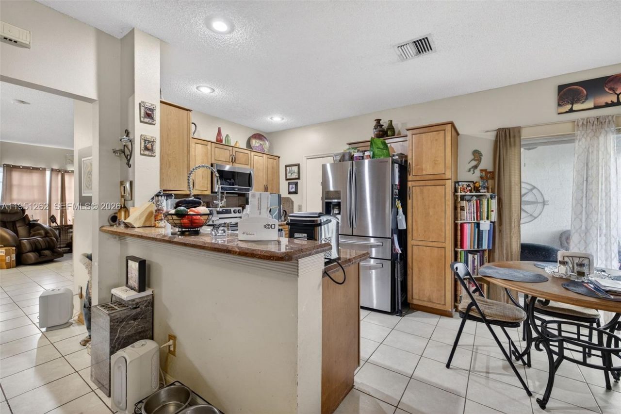 6008 N Golden Beauty Ln, Tamarac, FL 33321 Photo