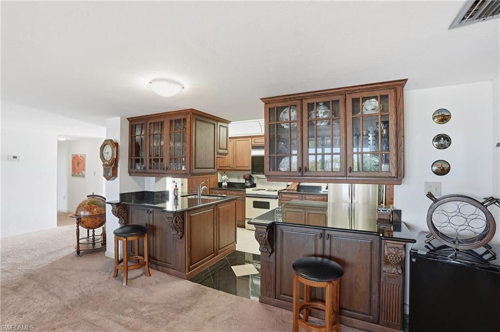 11 Bluebill Ave, Unit 203, Naples, FL 34108 Photo