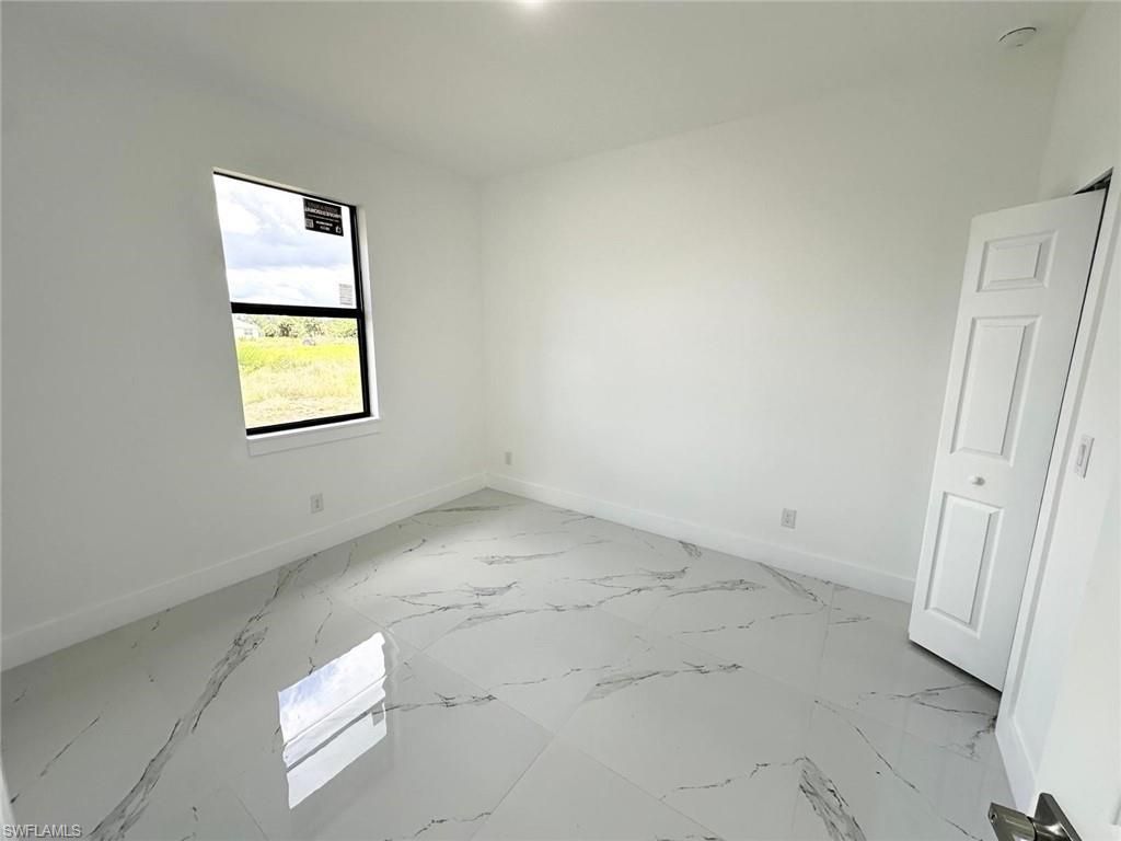 612 Ames St E, Lehigh Acres, FL 33974 Photo