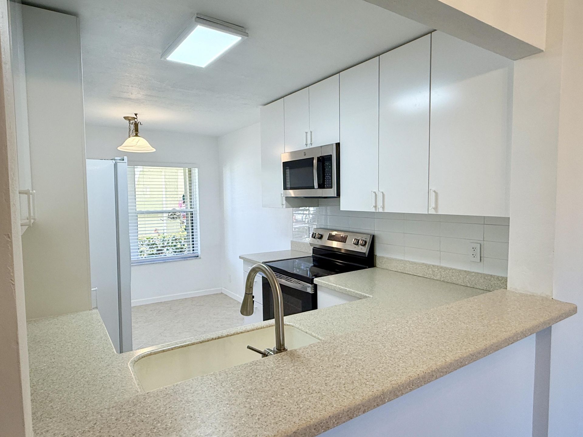 4745 Lucerne Lakes Boulevard, Unit 102, Lake Worth, FL 33467 Photo