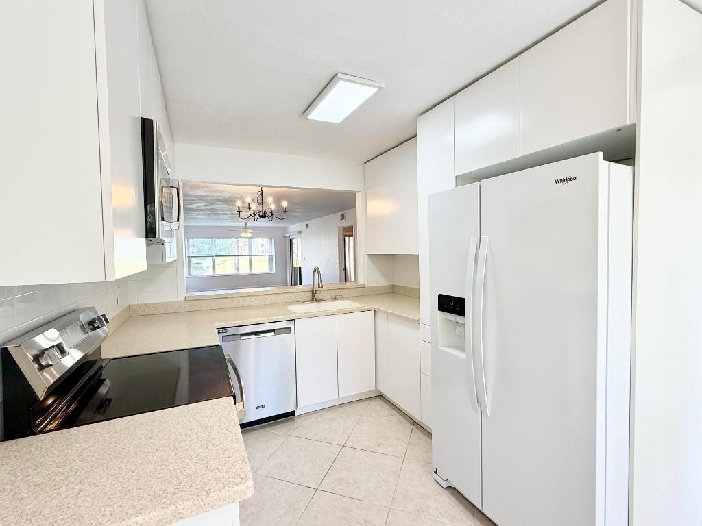 4745 Lucerne Lakes Boulevard, Unit 102, Lake Worth, FL 33467 Photo