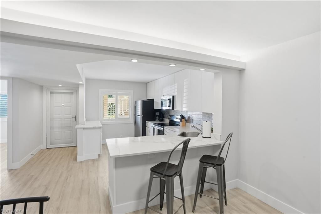 7797 Esmeralda Way, Unit K102, Naples, FL 34109 Photo