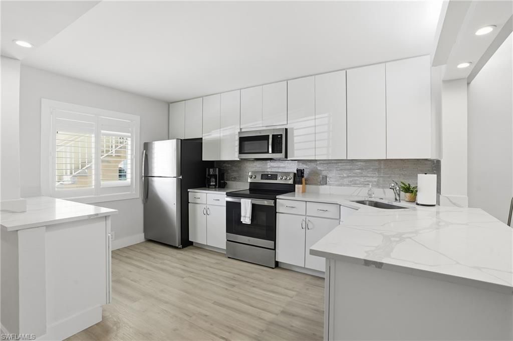 7797 Esmeralda Way, Unit K102, Naples, FL 34109 Photo
