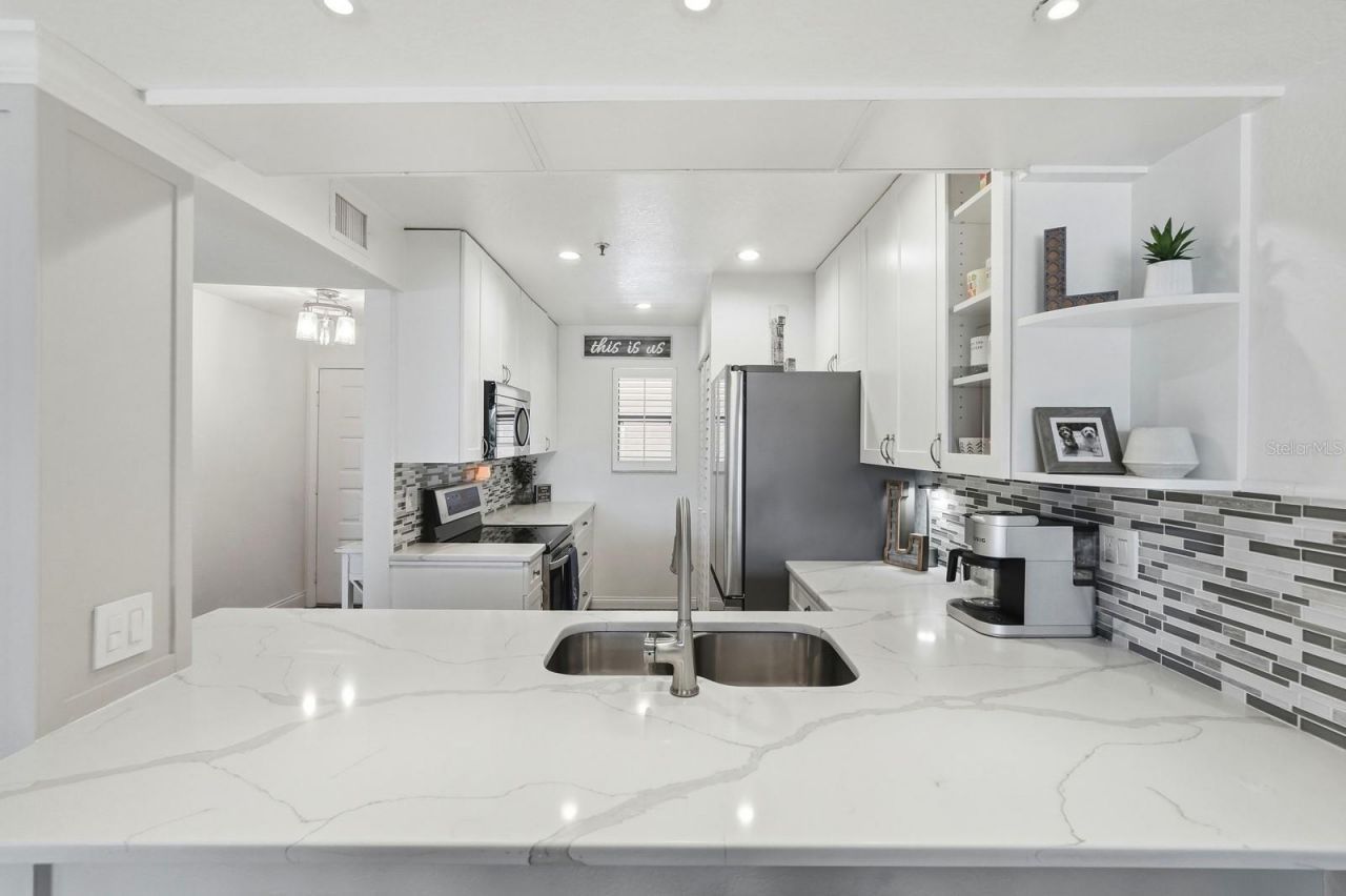 458 Bouchelle Drive, Unit 203, New Smyrna Beach, FL 32169 Photo