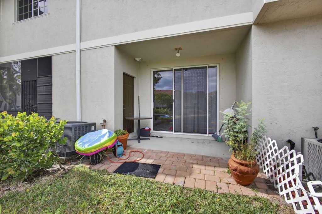 4147 Napoli Lake Drive, Riviera Beach, FL 33410 Photo