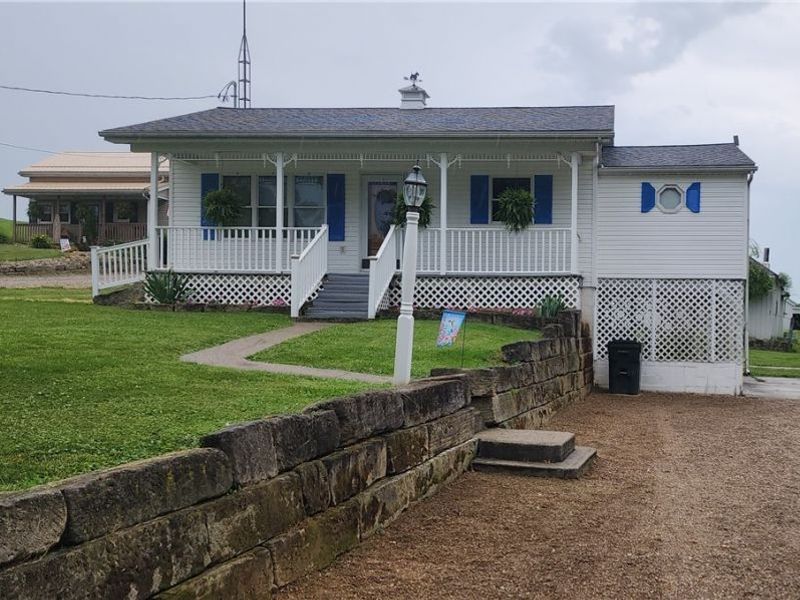 9090 Radcliffe Road, Adamsville, OH 43802 Photo 1