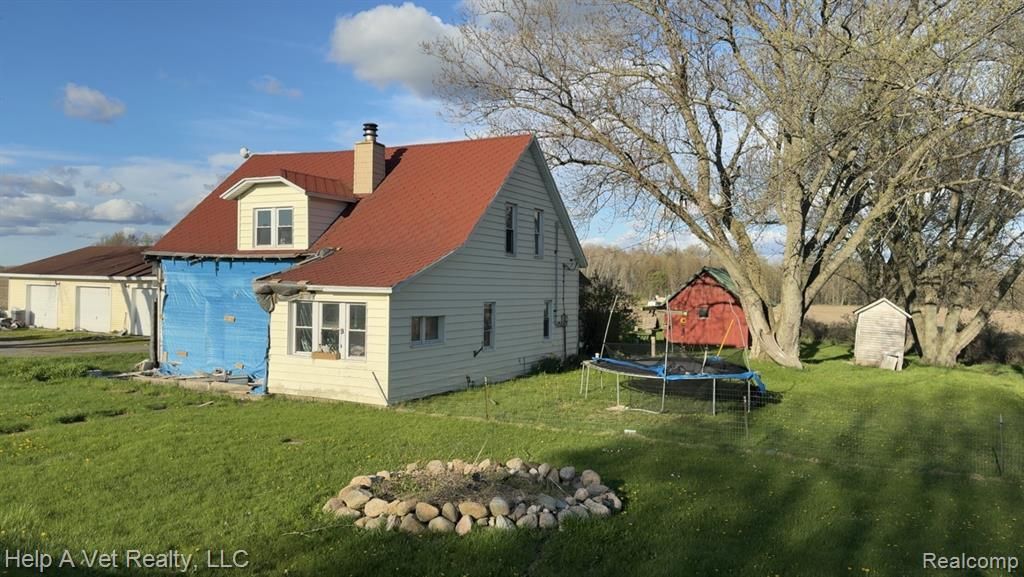 2258 N Schoenherr Road, Sheridan Township, MI 49405 Main Photo