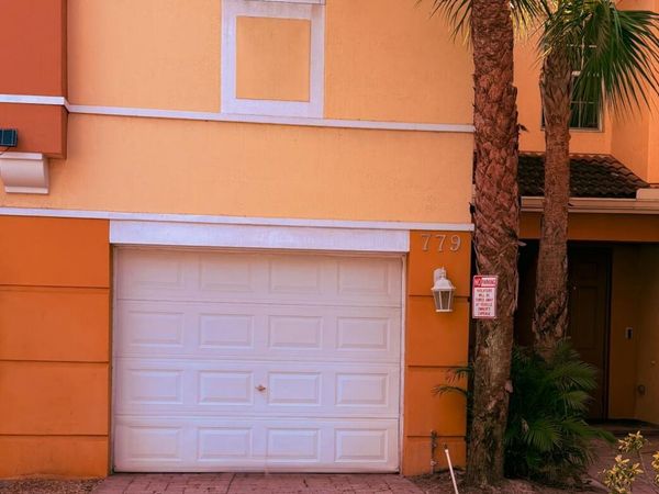 779 Pipers Cay Drive, Unit 104, West Palm Beach, FL 33415