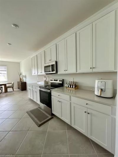 9291 Aqua Overlook Ct, Lehigh Acres, FL 33936 Photo