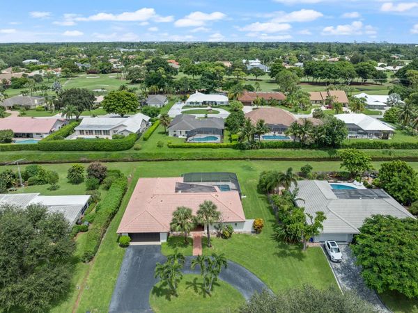 516 Muirfield Drive, Atlantis, FL 33462