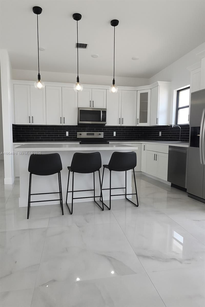 761 Bell Blvd , Lehigh Acres, FL 33974 Photo