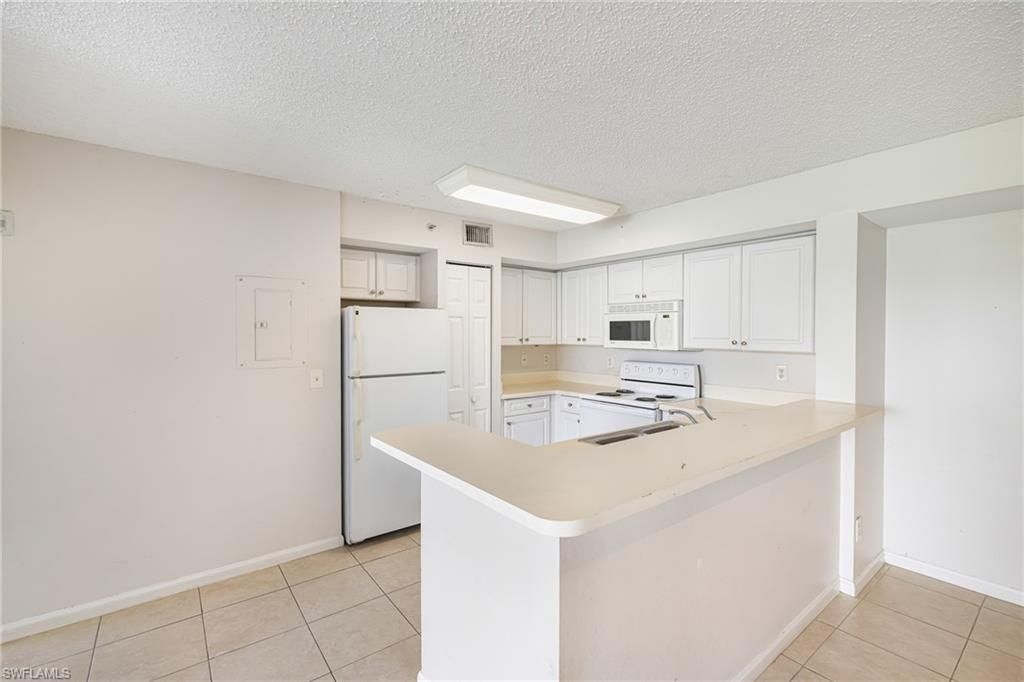1265 Wildwood Lakes Blvd, Unit 106, Naples, FL 34104 Photo
