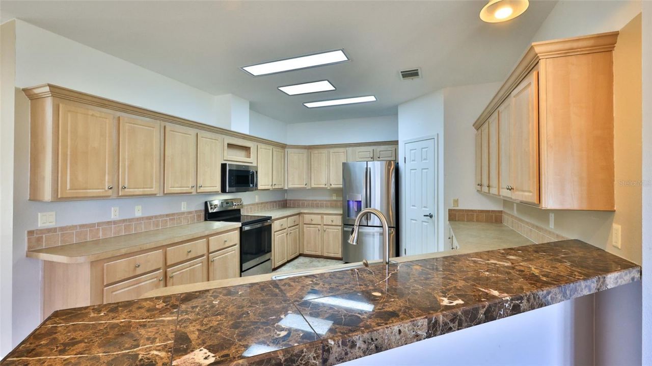 361 Marsh Landing Loop, Oak Hill, FL 32759 Photo