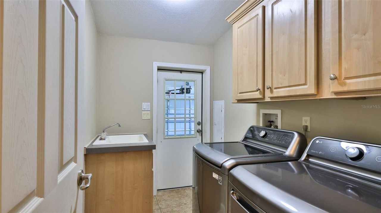 361 Marsh Landing Loop, Oak Hill, FL 32759 Photo
