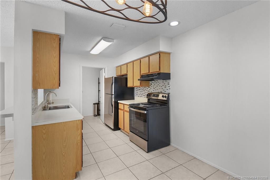 4041 NW Cinnamon Tree Circle, Jensen Beach, FL 34957 Photo