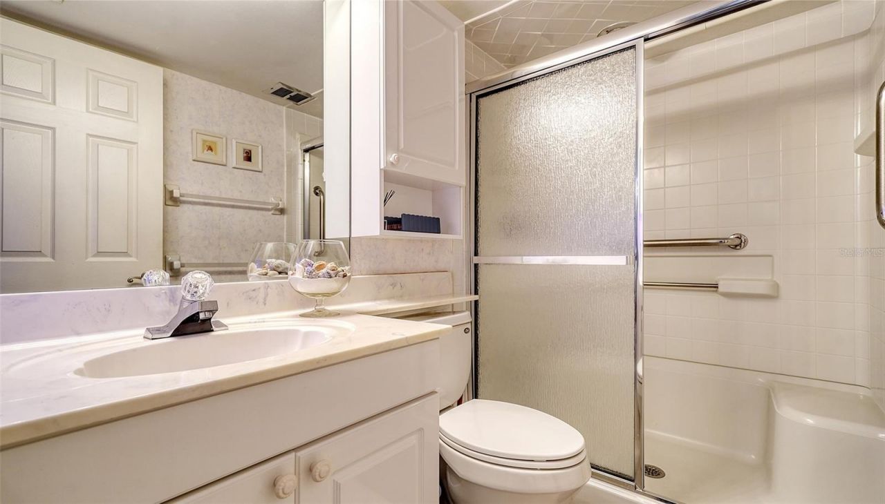 19 Whispering Sands Drive, Unit 201, Sarasota, FL 34242 Photo