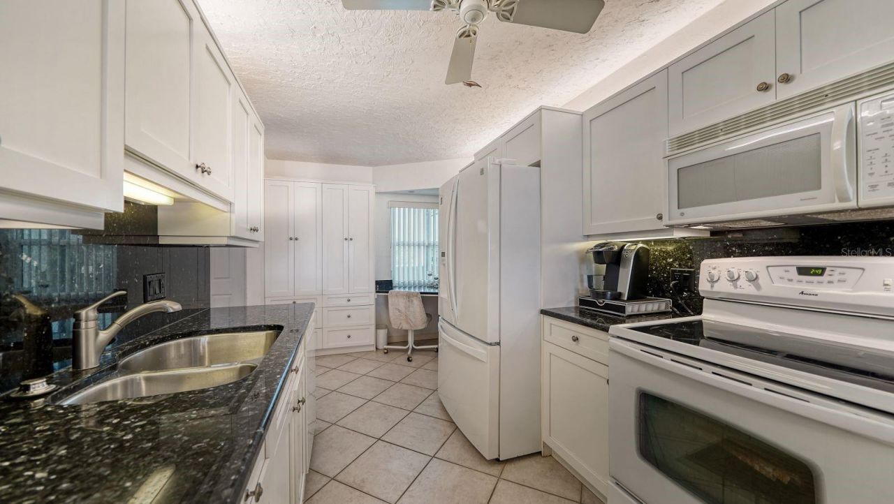 19 Whispering Sands Drive, Unit 201, Sarasota, FL 34242 Photo