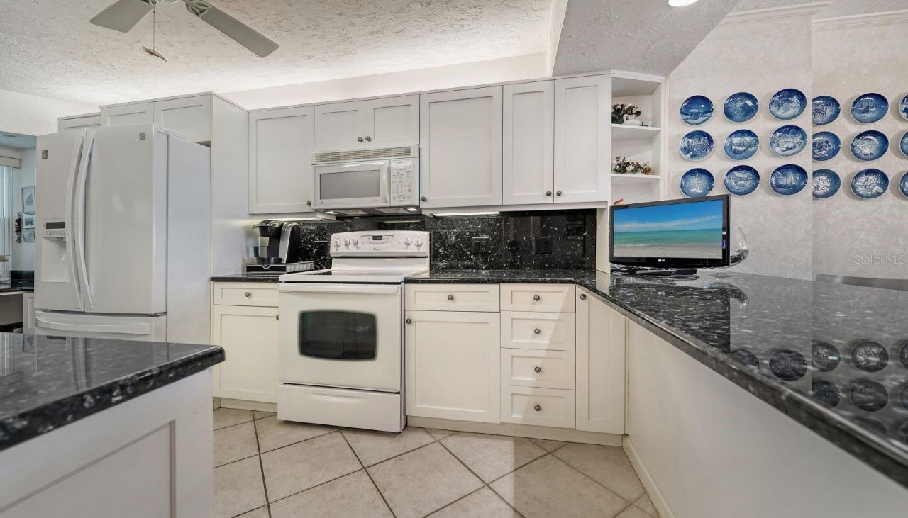 19 Whispering Sands Drive, Unit 201, Sarasota, FL 34242 Photo
