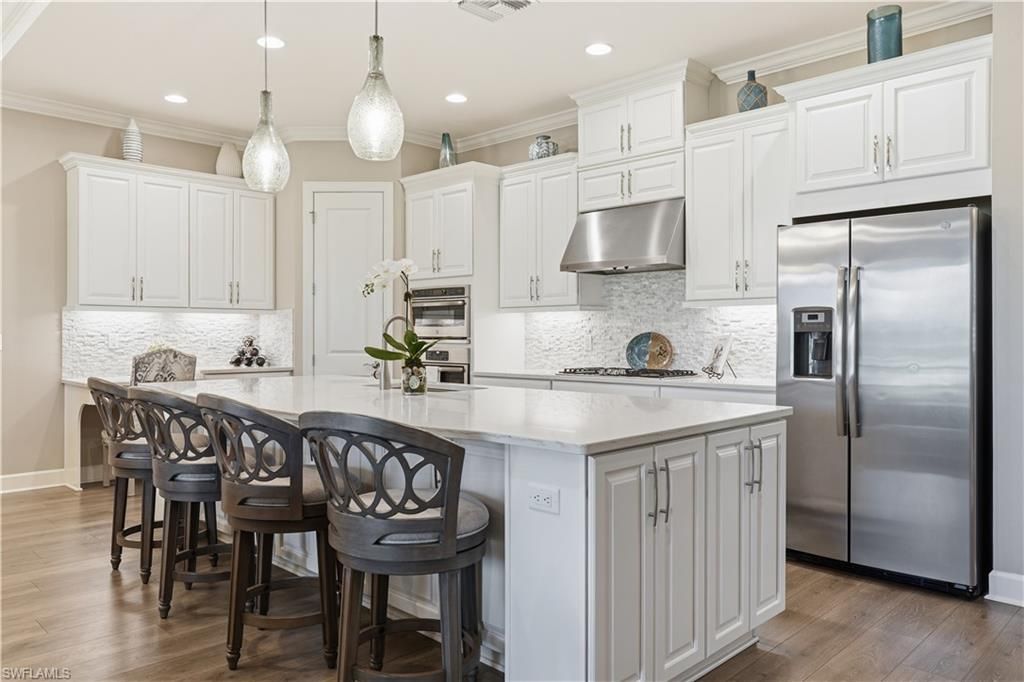 8665 Dilillo Ct, Naples, FL 34119 Photo