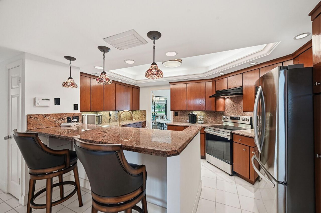 1109 E Marine Way E, Unit L1l + Boat, North Palm Beach, FL 33408 Photo