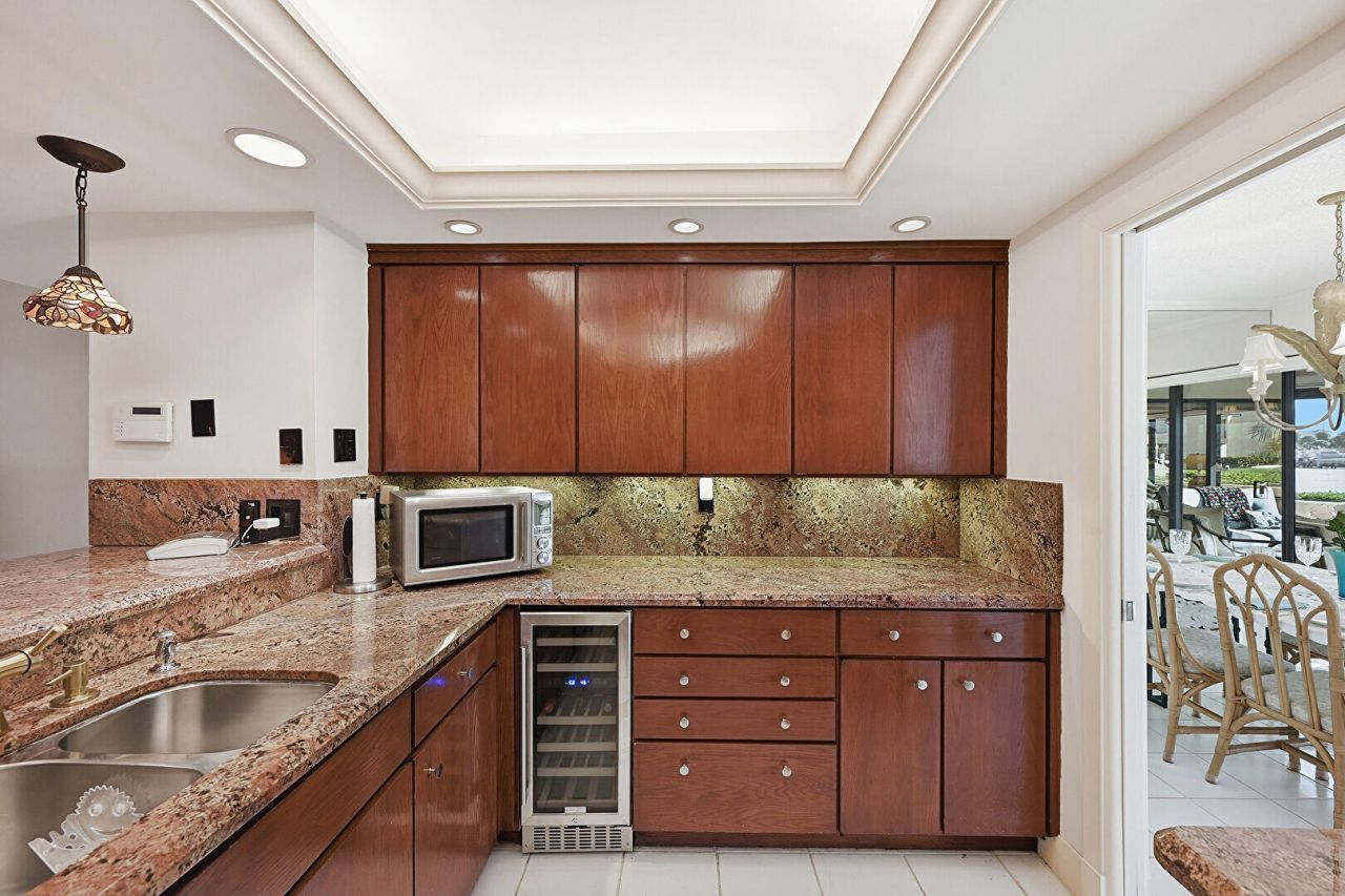 1109 E Marine Way E, Unit L1l + Boat, North Palm Beach, FL 33408 Photo