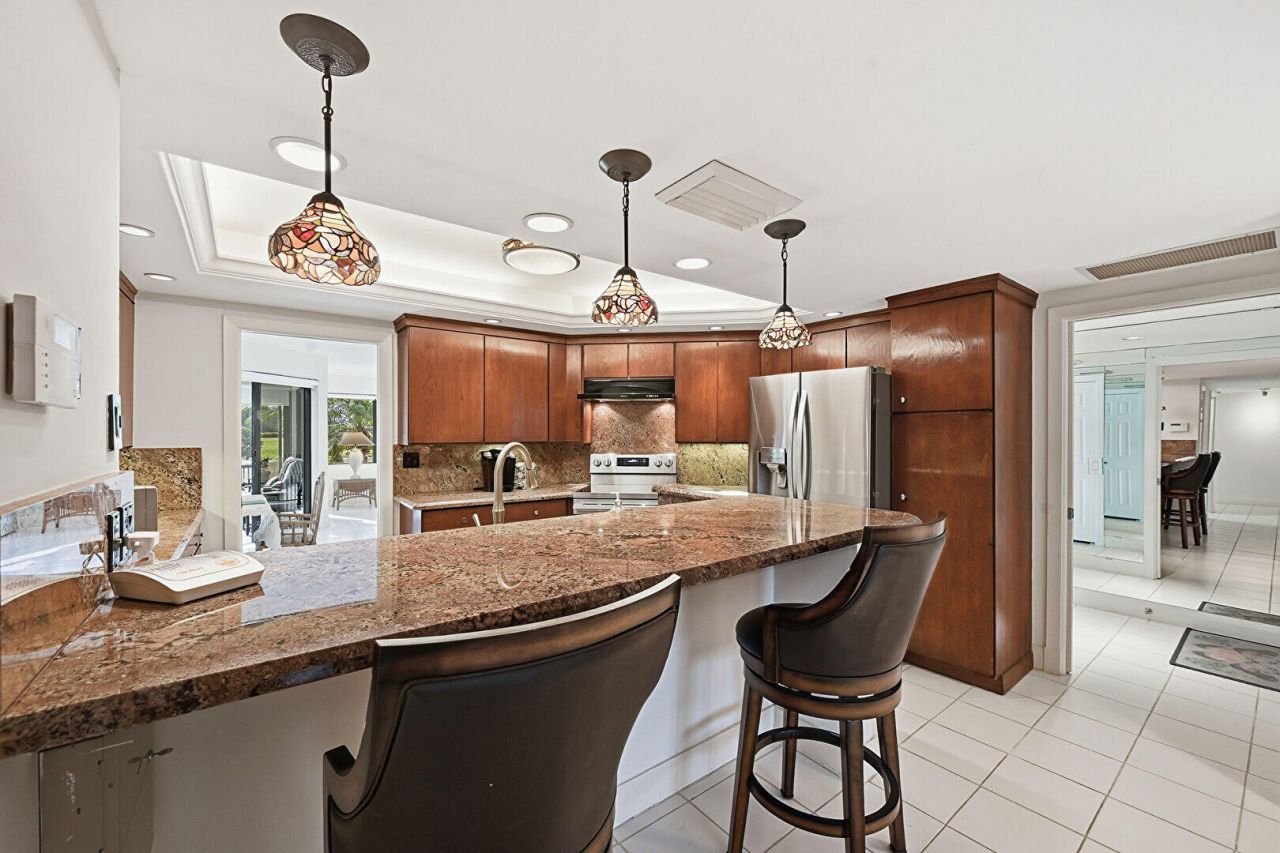 1109 E Marine Way E, Unit L1l + Boat, North Palm Beach, FL 33408 Photo