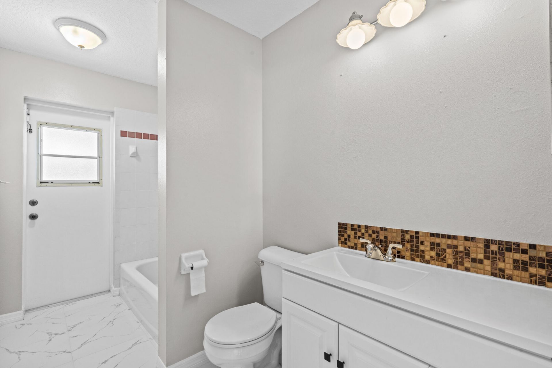 5958 NW Baynard Drive, Port Saint Lucie, FL 34986 Photo