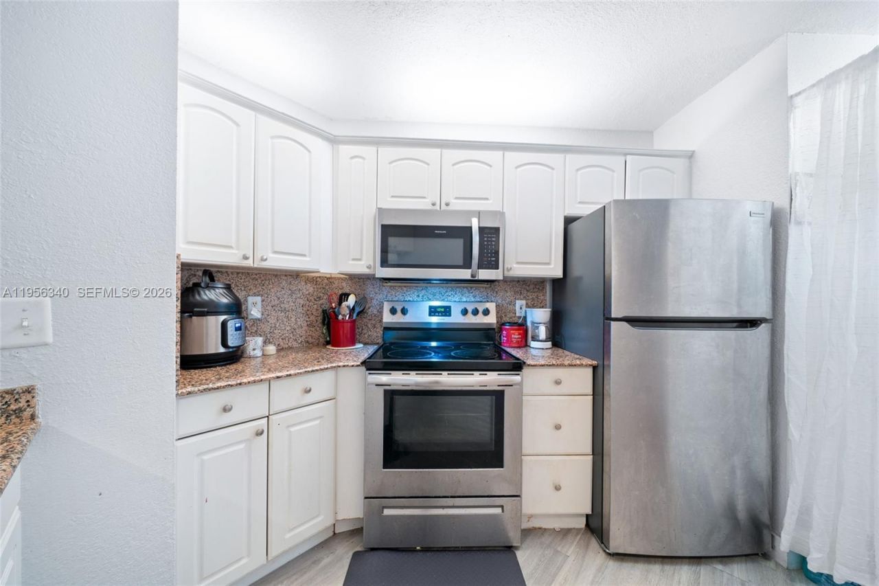 10551 W Broward Blvd , Unit 408, Plantation, FL 33324 Photo