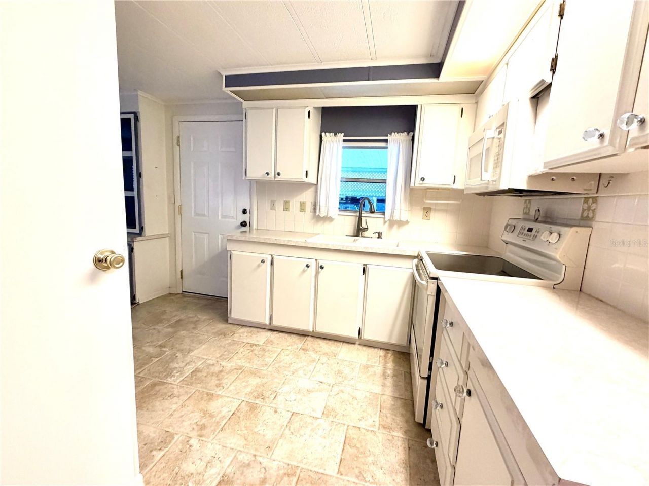 3335 S Citrus Circle, Unit GE, Zellwood, FL 32798 Photo