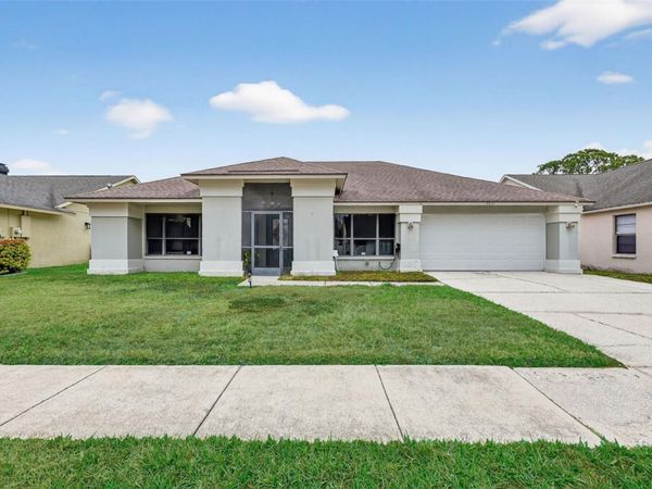 9410 PEBBLE GLEN AVENUE, TAMPA, FL 33647